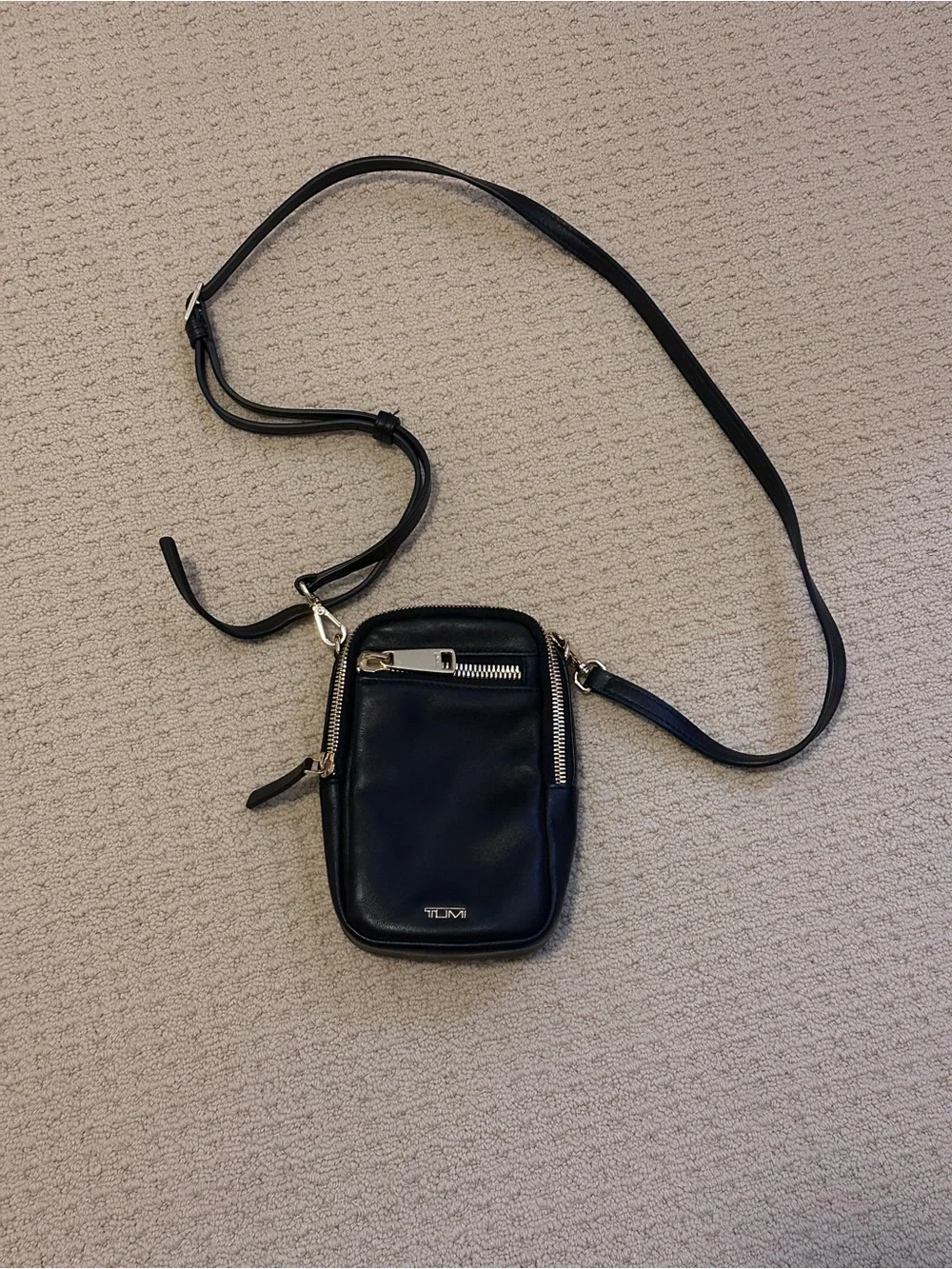 Tumi Black Leather Crossbody Phone Pouch with Silver Hardware